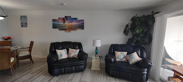 living area featuring hardwood / wood-style floors