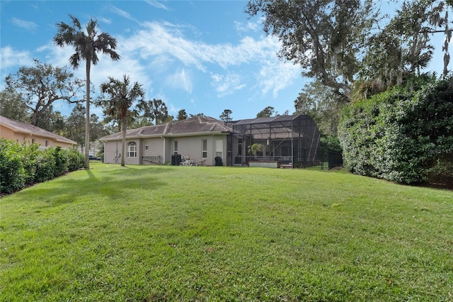 view of yard featuring a lanai