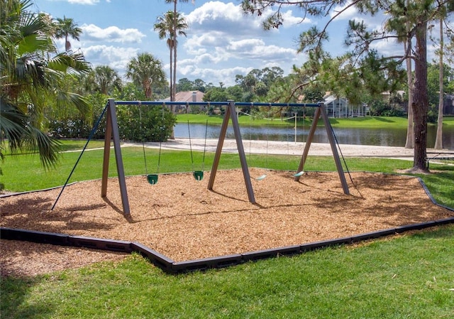 view of play area with a water view