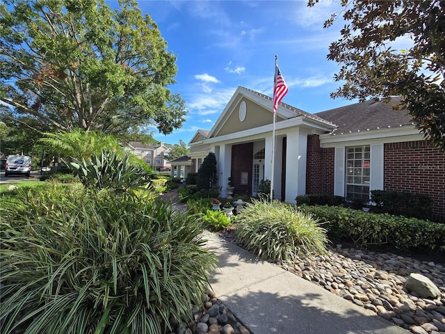 13103 Mulberry Park Dr Unit 817, Orlando, FL 32821 - view of front facade featuring brick siding