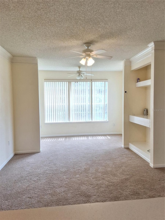 13103 Mulberry Park Dr Unit 817, Orlando, FL 32821 - carpeted spare room featuring a ceiling fan and a textured ceiling