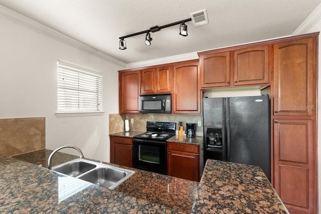 kitchen with ornamental molding, rail lighting, black appliances, and sink