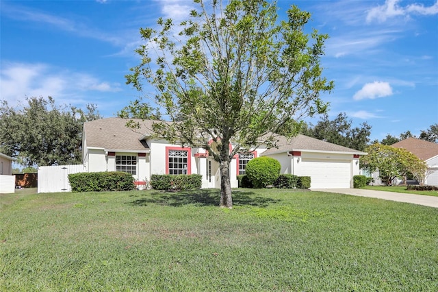 view of front facade featuring a garage and a front lawn