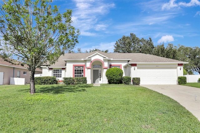 single story home with a front lawn and a garage