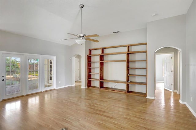 unfurnished living room featuring light hardwood / wood-style flooring and ceiling fan