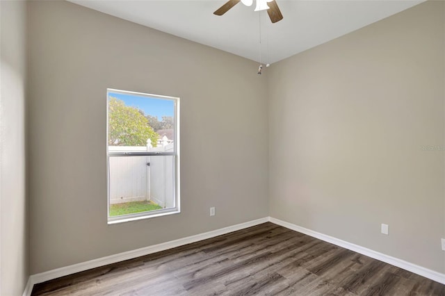 unfurnished room with hardwood / wood-style floors and ceiling fan