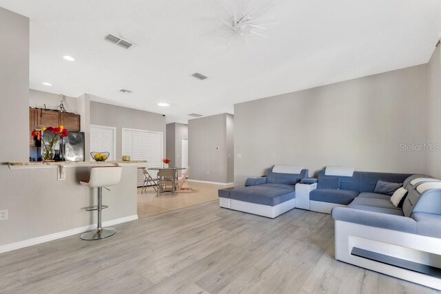 living room with light wood-type flooring