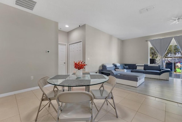 dining area featuring light tile patterned floors