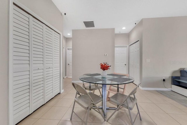 dining room featuring light tile patterned floors