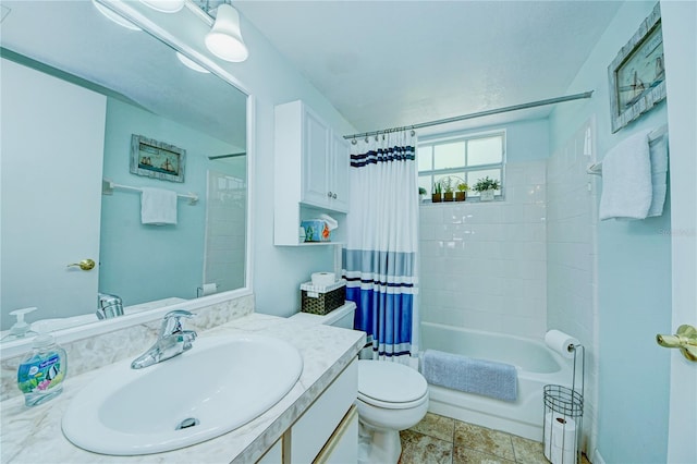 full bathroom with tile patterned flooring, shower / bath combination with curtain, toilet, and vanity