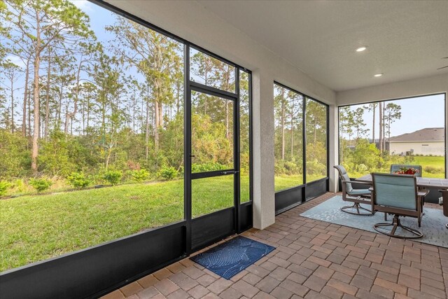 sunroom featuring a healthy amount of sunlight