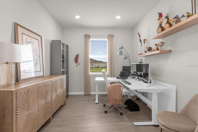 office space with light hardwood / wood-style floors