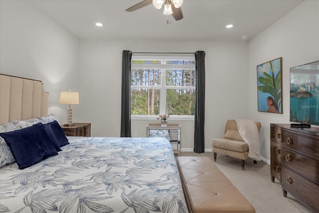 carpeted bedroom with ceiling fan