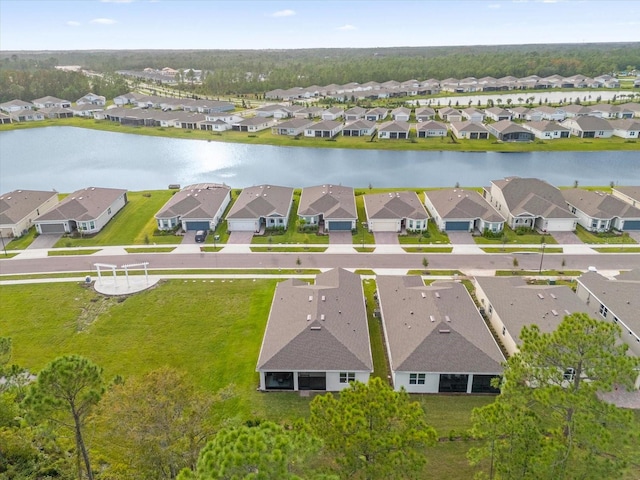 bird's eye view with a water view