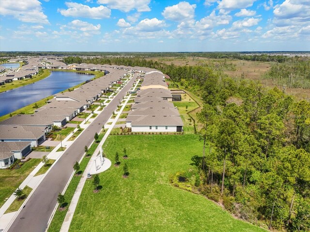 aerial view with a residential view and a water view