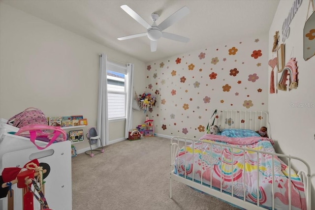 carpeted bedroom with ceiling fan