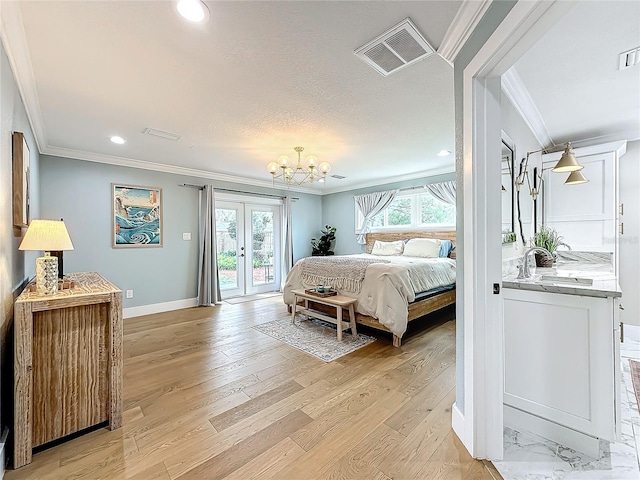 bedroom with french doors, light hardwood / wood-style floors, ornamental molding, and access to outside