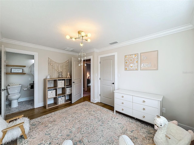 bedroom featuring ornamental molding, ensuite bathroom, and dark wood-type flooring