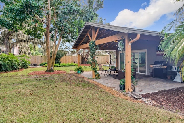 view of yard featuring a gazebo and a patio area