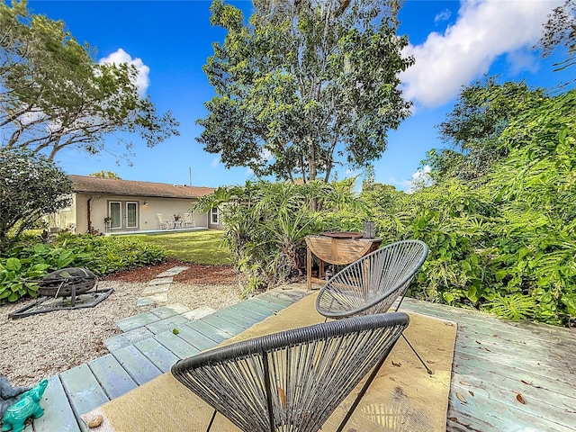 view of patio / terrace with a fire pit