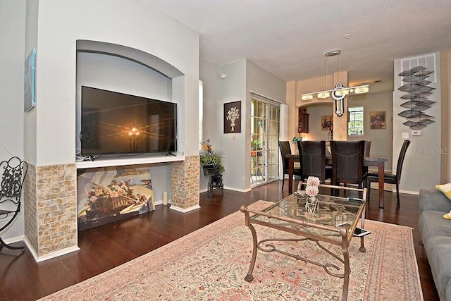 living room featuring dark hardwood / wood-style floors