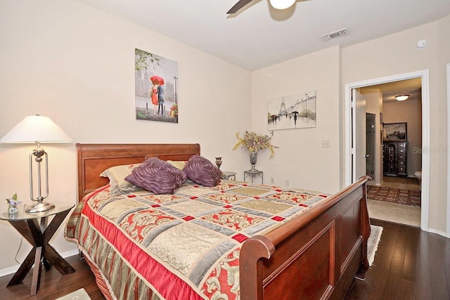 bedroom featuring dark hardwood / wood-style floors and ceiling fan