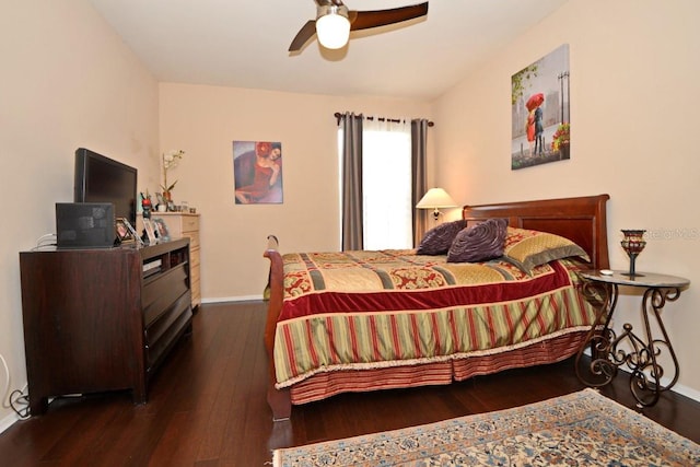 bedroom featuring ceiling fan and dark hardwood / wood-style flooring