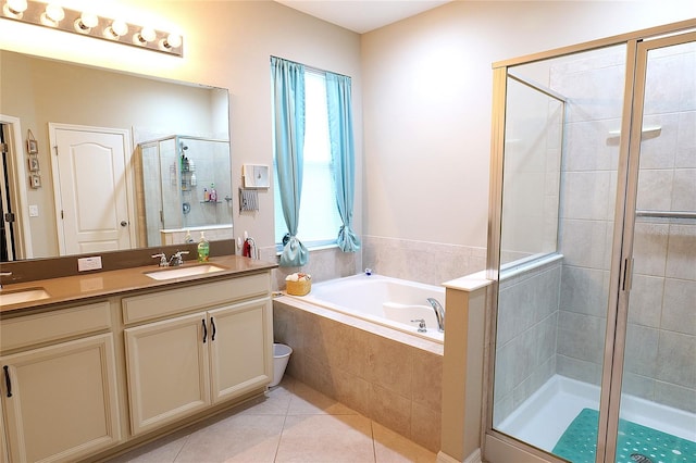 bathroom with plus walk in shower, tile patterned floors, and a wealth of natural light