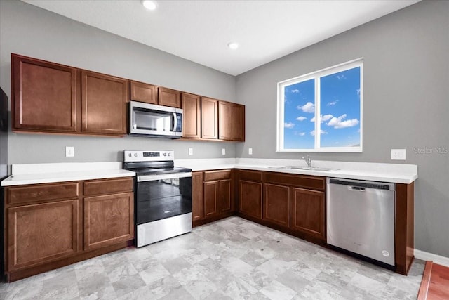 kitchen with sink and stainless steel appliances