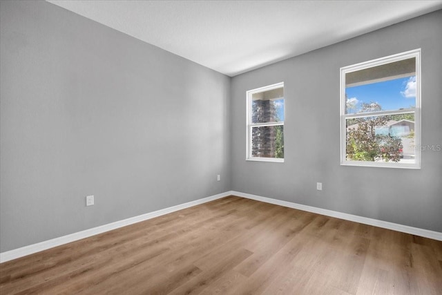 empty room featuring light hardwood / wood-style floors