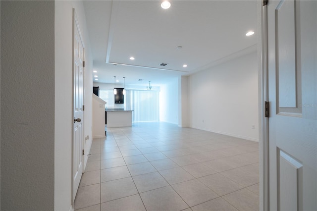 unfurnished living room with light tile patterned flooring