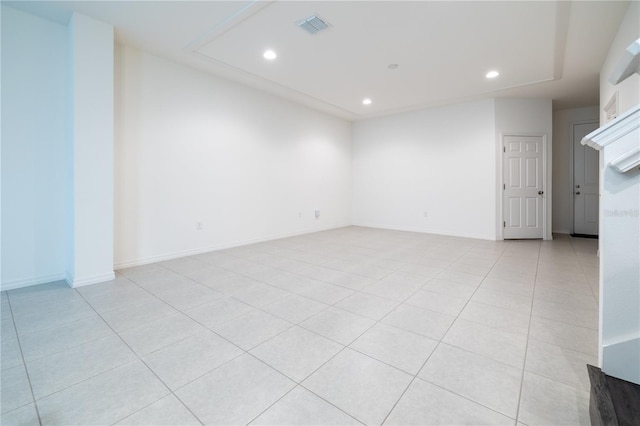 unfurnished room with light tile patterned floors