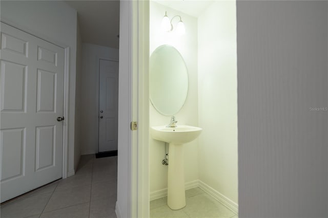 bathroom with tile patterned flooring