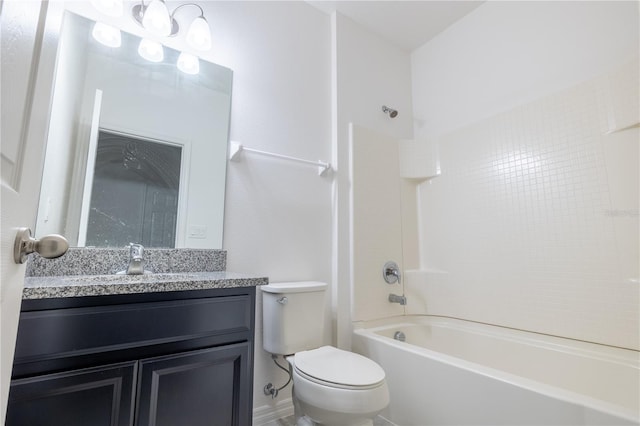 full bathroom featuring bathtub / shower combination, vanity, and toilet