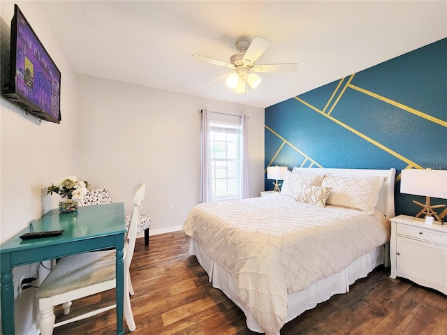 bedroom featuring ceiling fan and dark hardwood / wood-style flooring