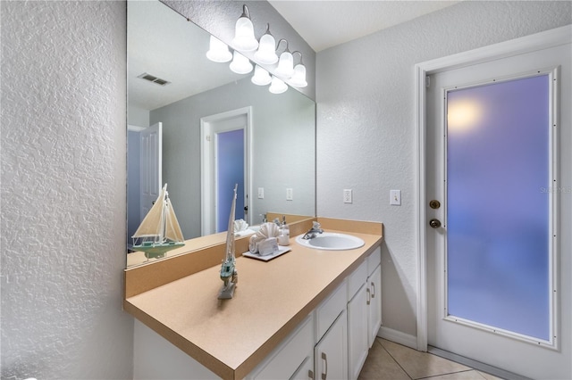 bathroom featuring tile patterned floors and vanity