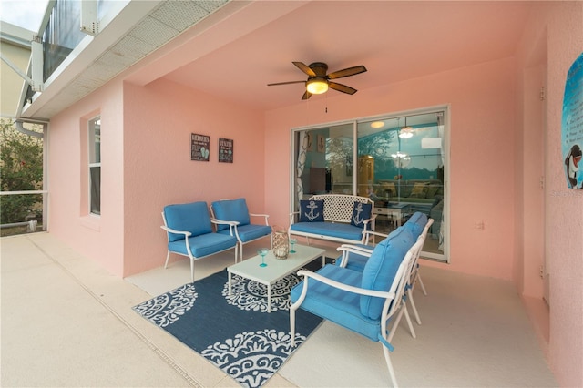 view of patio / terrace with ceiling fan and an outdoor hangout area