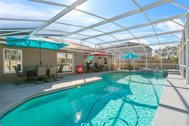 view of pool featuring a patio and a lanai