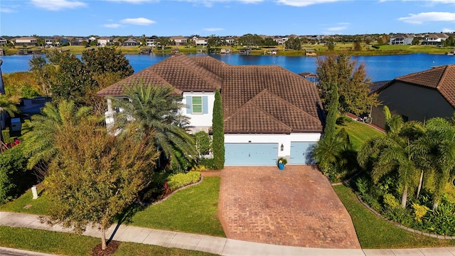 bird's eye view with a water view