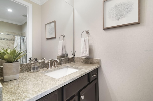 full bath featuring curtained shower, vanity, and crown molding