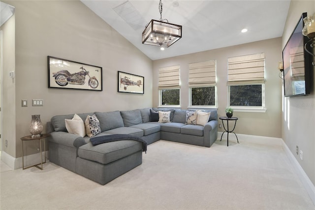 carpeted living area featuring lofted ceiling, an inviting chandelier, baseboards, and recessed lighting