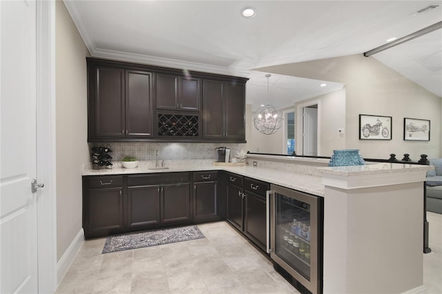 bar featuring lofted ceiling, beverage cooler, a sink, visible vents, and decorative backsplash