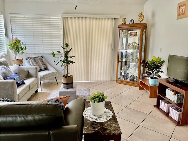 living room with light tile patterned flooring