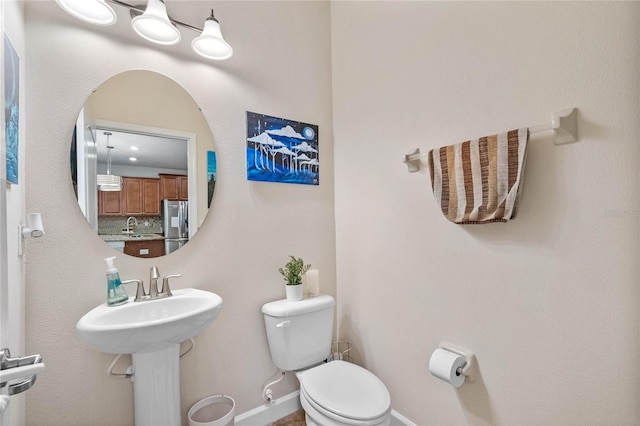 bathroom featuring toilet