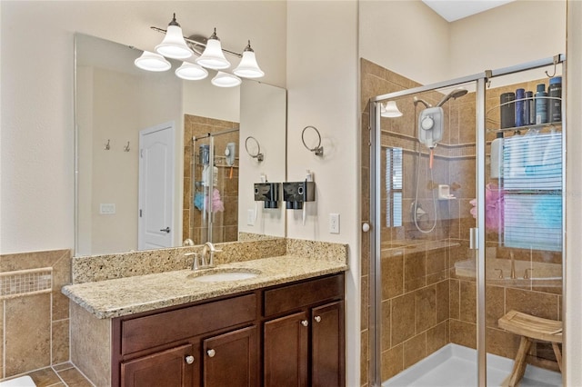 bathroom with vanity and walk in shower