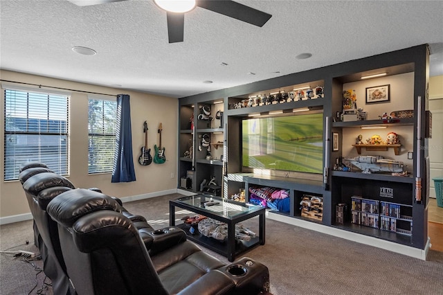 living room with carpet, ceiling fan, and a textured ceiling