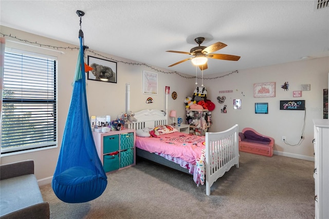 bedroom featuring ceiling fan and carpet floors