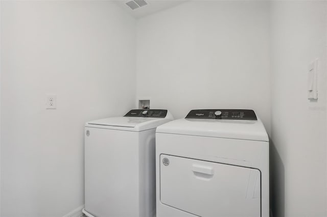 laundry room featuring washer and dryer