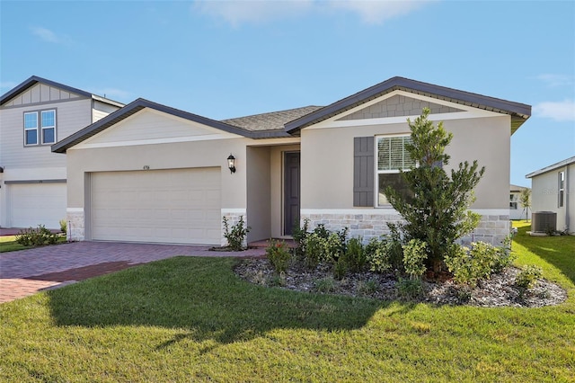 view of front facade with a front lawn and a garage