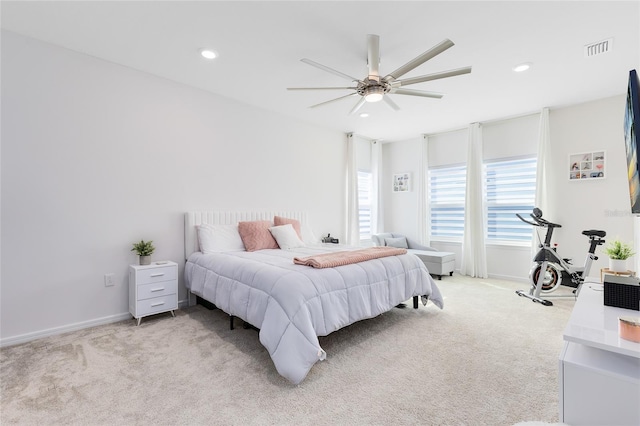 carpeted bedroom with ceiling fan